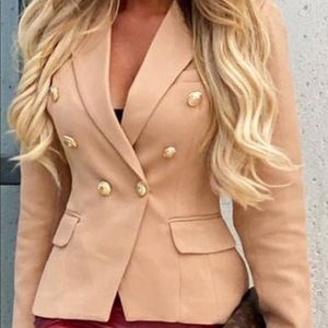 Blazer ordered from uk but fits s to m size .